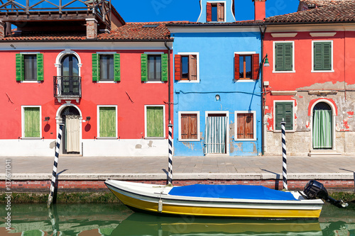 Boat and colorful houses of Burano, Italy. © Rostislav Glinsky