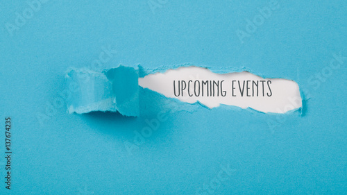 Upcoming Events message on Paper torn ripped opening