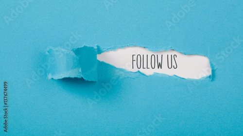 Follow us message on Paper torn ripped opening