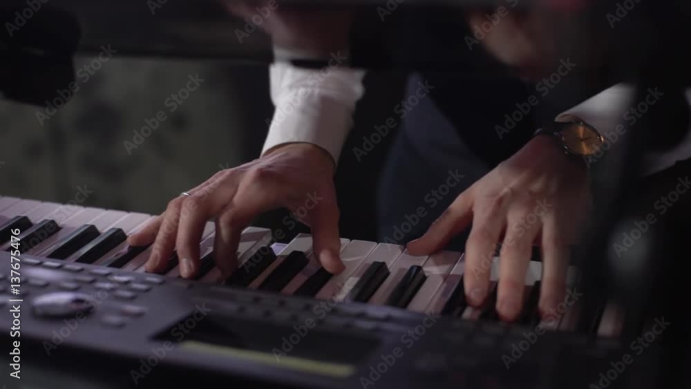 playing the piano at the concert playing the piano at the concert