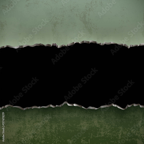 Metallic green torn surface. Textured military background.