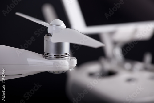 Propeller of white drone with remote control