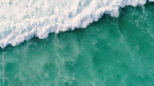Waves breaking on a beach in Bali