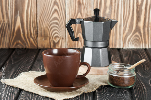 Coffee maker on wood desk