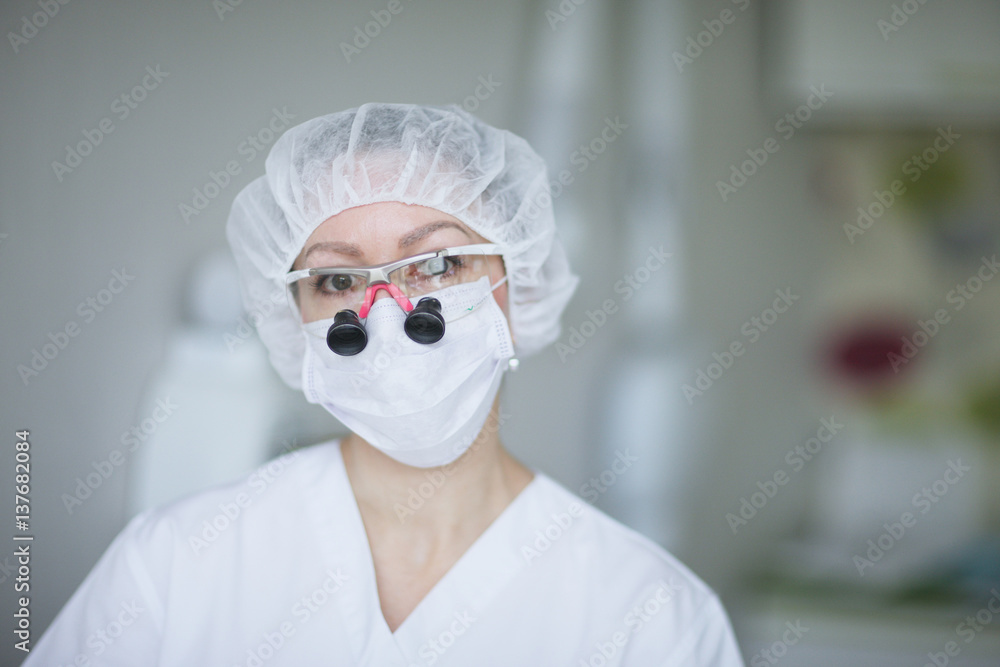 Portrait of a woman dentist in uniform Portrait of a woman dentist in uniform