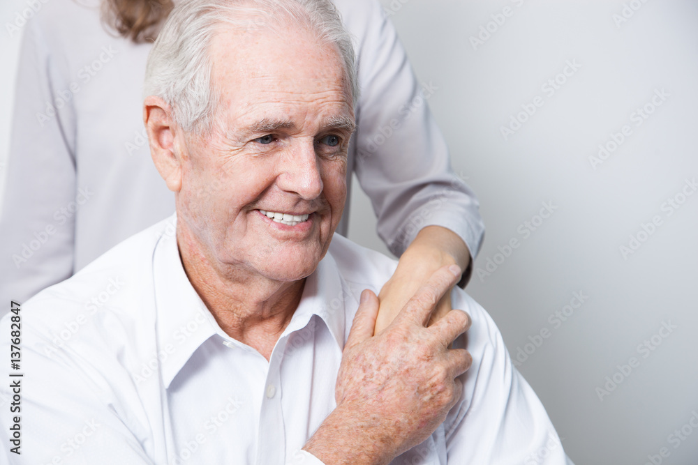 Daughter Taking Care of Smiling Senior Father Daughter Taking Care of Smiling Senior Father
