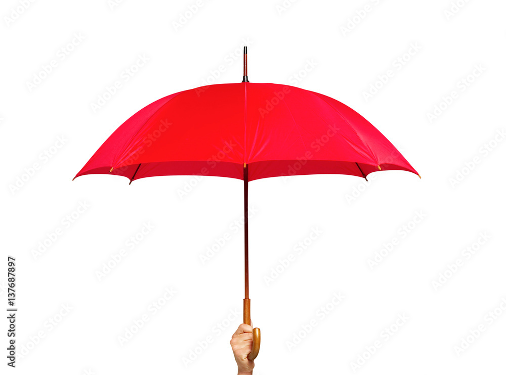 Red umbrella in hand isolated on white