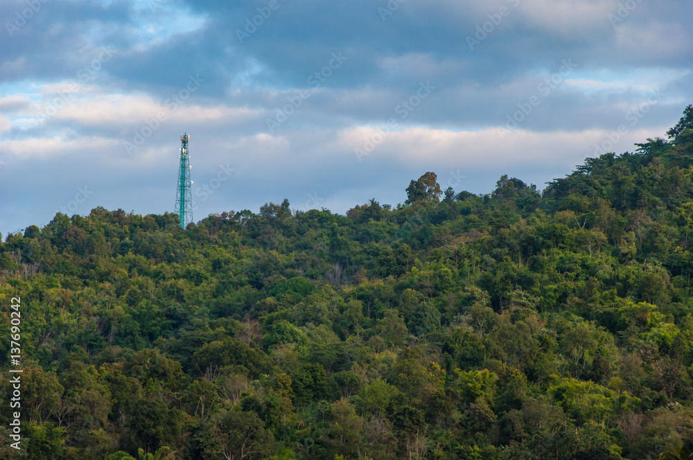Telecom Tower on the mountain with blue sky background Telecom Tower on the mountain with blue sky background