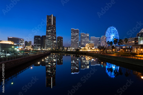Cityscape of Minato Mirai area of Yokohama City at dusk (横浜みなとみらい地区夕景) in Kanagawa, Japan.