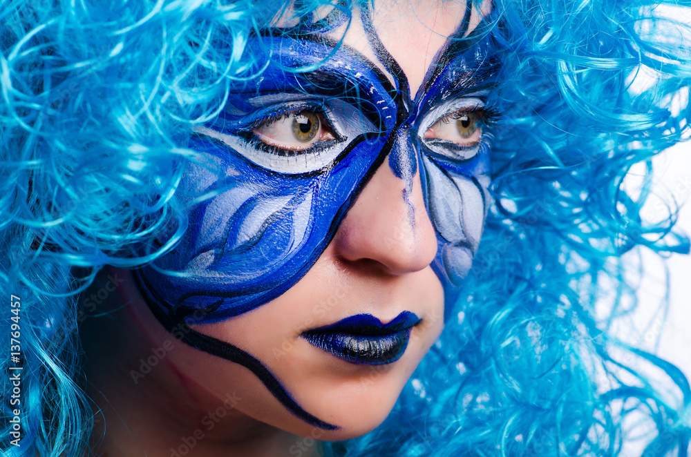 Face paint of woman with butterfly