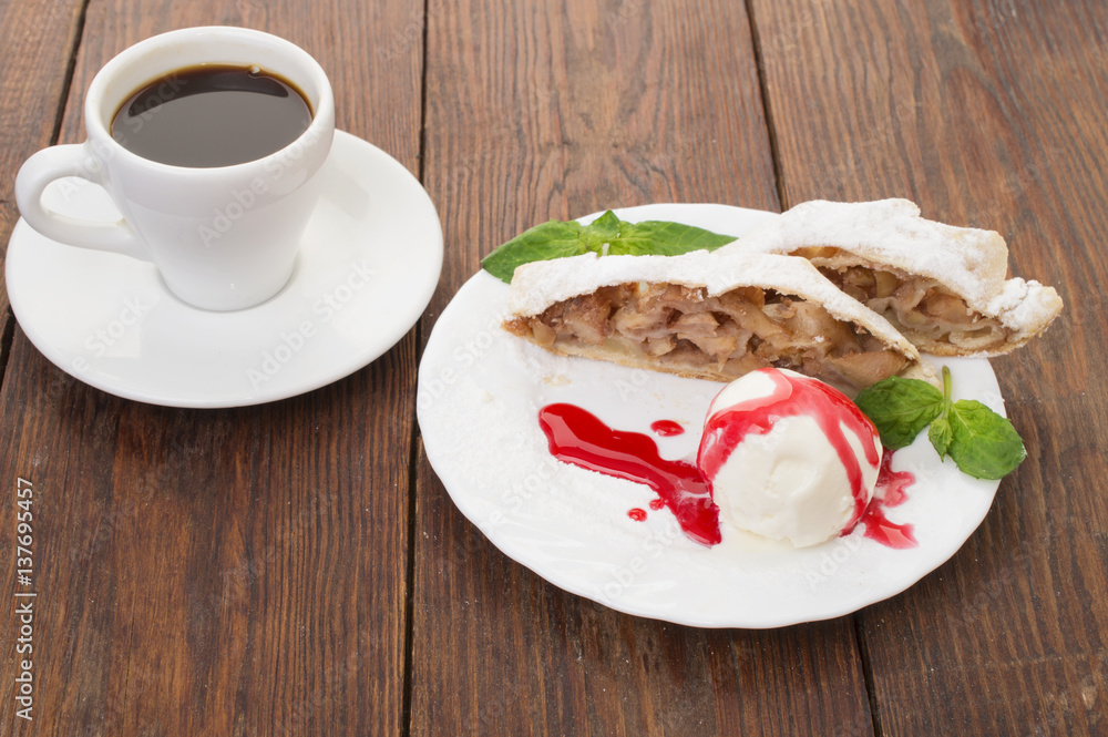 apple strudel with ice cream and a cup of coffee apple strudel with ice cream and a cup of coffee