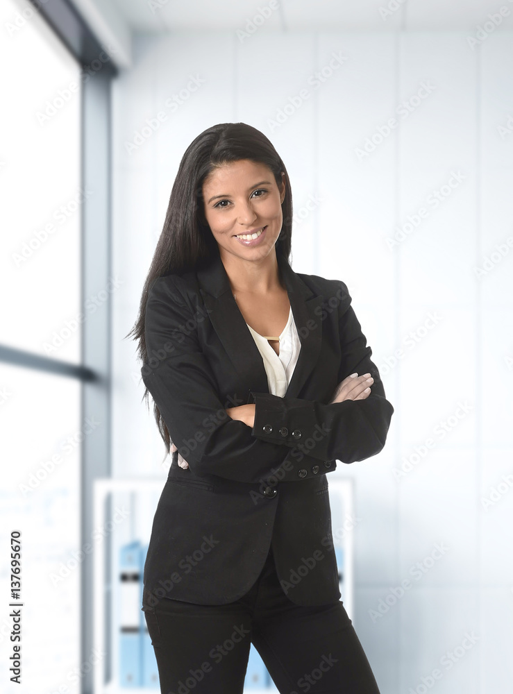corporate portrait of young attractive latin business woman wearing formal suit smiling happy corporate portrait of young attractive latin business woman wearing formal suit smiling happy