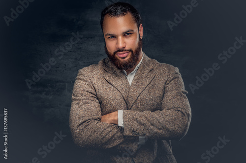  Black male dressed in a suit from a wool. © Fxquadro