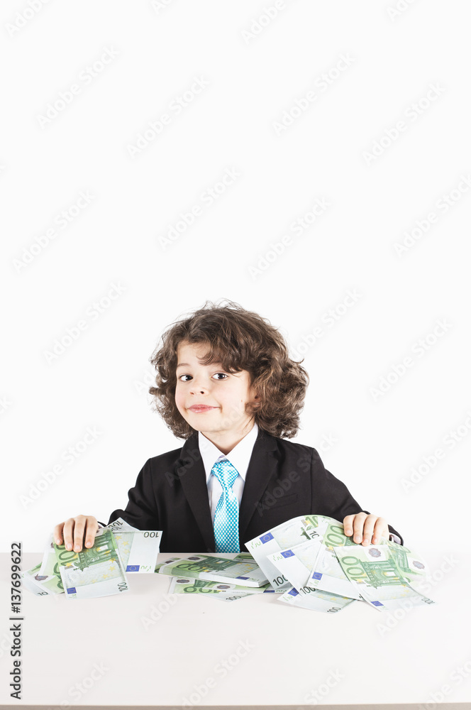 Young businessman holding money in his hands. Close-up. White background. Young businessman holding money in his hands. Close-up. White background.