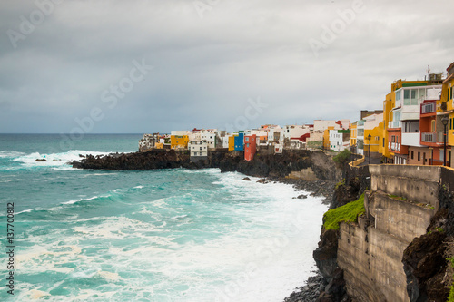 View of colourful houses of Punta Brava from beach in Puerto de la Cruz, Tenerife © dtatiana