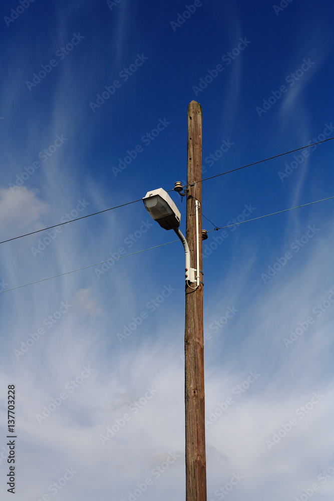 Current mast with lamp