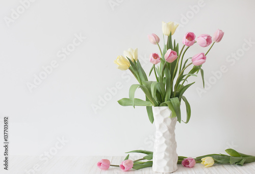 tulips in vase  on white background #137703692