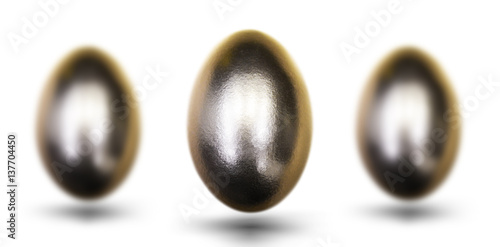 Golden egg for Easter on white background.