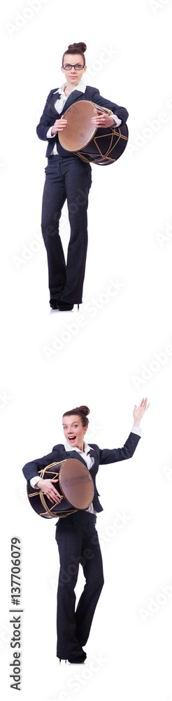 Fototapeta premium Funny businesswoman with drum isolated on white