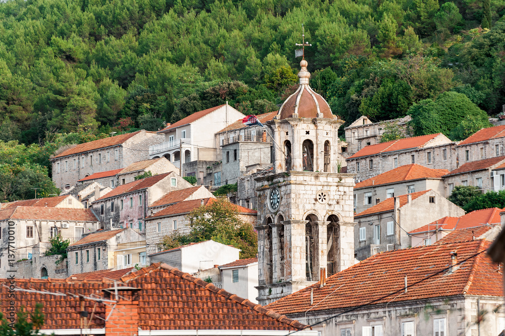 Old rooftops and church bell tower in Blato on Korcula in Croatia