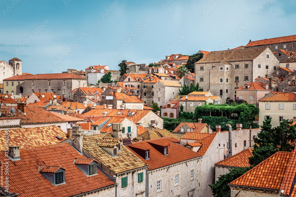 Rooftops in Dubrovnik old town in Croatia on a sunny day with blue sky