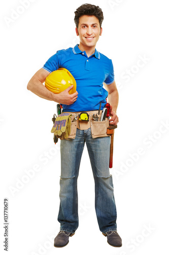 Handwerker mit Helm und Werkzeug