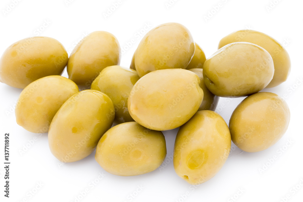 Green big olives on the white background. Green big olives on the white background.