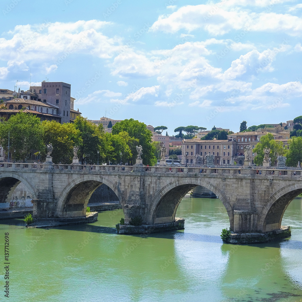 Roma, Italy - August, 7, 2016: Bridge Ponte, Sant'Angelo from Tiber in Roma, Italy Roma, Italy - August, 7, 2016: Bridge Ponte, Sant'Angelo from Tiber in Roma, Italy