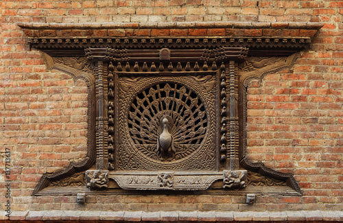 Peacock window, a symbol of Newar culture and artistry. Bhaktapur, Kathmandu valley, Nepal. photo
