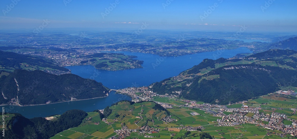 Lake Vierwaldstattersee and Lucerne in summer. View from mount Stanserhorn.