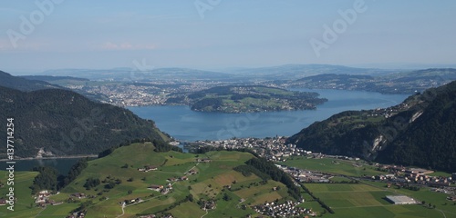 Lake Vierwaldstattersee, Lucerne and green farmland. photo