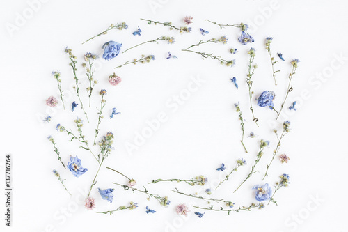 Flowers composition. Frame made of dried flowers on white background. Flat lay  top view
