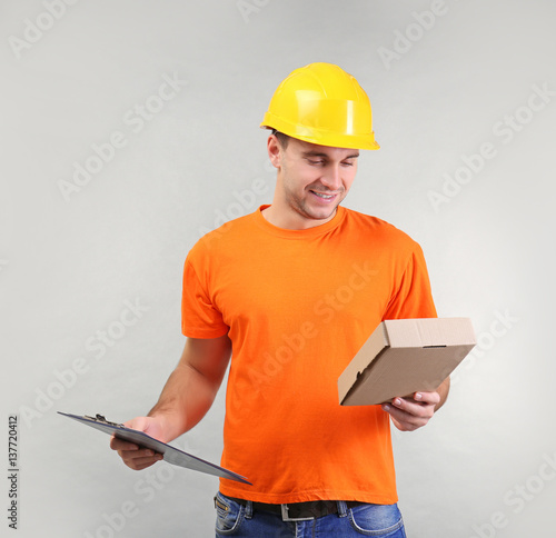 Handsome warehouse worker w...