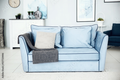 Sofa in modern room interior
