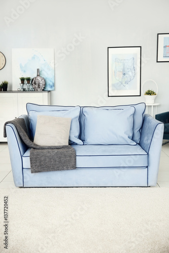 Sofa in modern room interior
