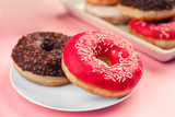 Tasty donuts on plate, closeup