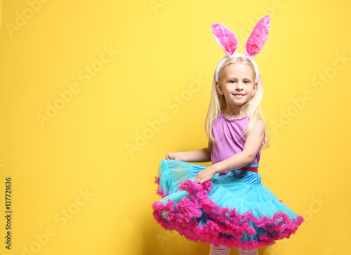 Cute little girl with bunny...
