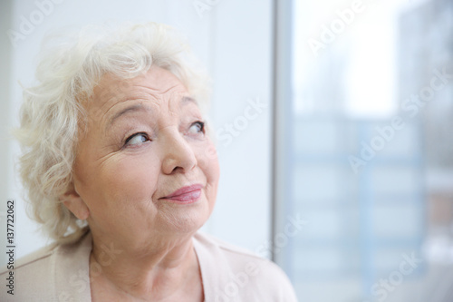 Elderly woman's portrait in...