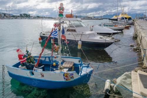  Boat decorated for Christmas in the port of Aegina, Greece. photo