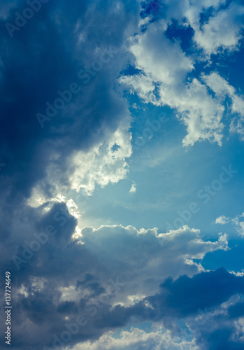 Blue cloudy dramatic sky  summer day