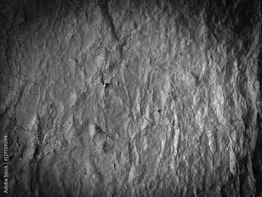 Naklejka premium Black stone natural texture background surface, close up image