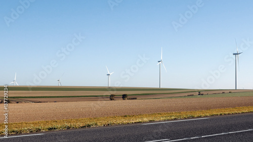 Wind turbines farm using renewable energy to generate electrical power. Renewable energy is most sustainable way of power generation.
