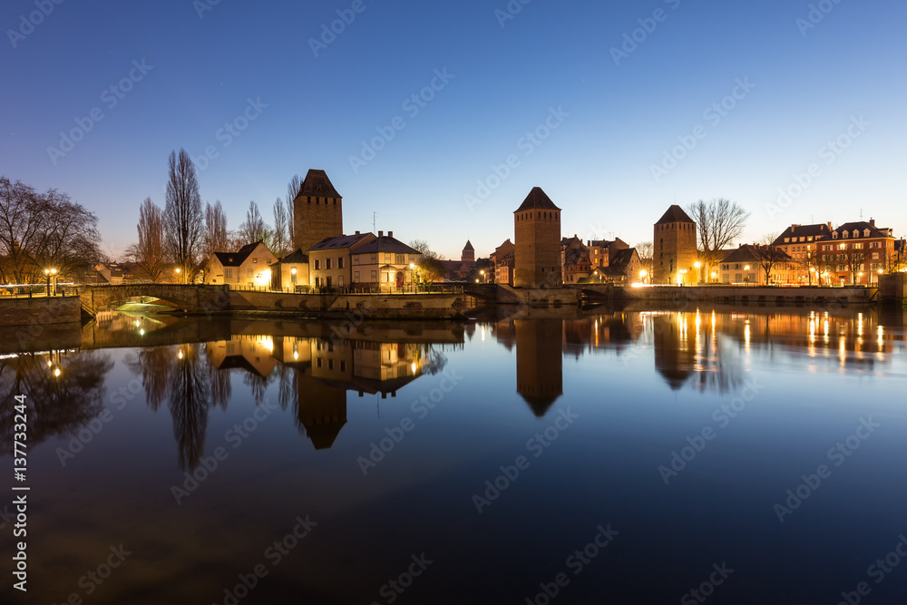 The Ponts Couvertes, a medieval defensive fortification, located in the Petite France district of Strasbourg, France on a winter morning at dawn.