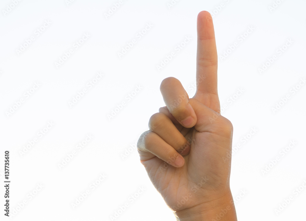 .Children raised finger as a sign symbolic white backdrop beautifully clear. .Children raised finger as a sign symbolic white backdrop beautifully clear.