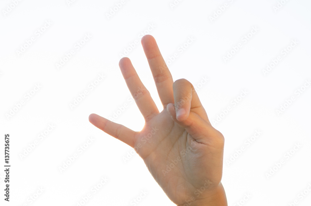 .Children raised finger as a sign symbolic white backdrop beautifully clear. .Children raised finger as a sign symbolic white backdrop beautifully clear.