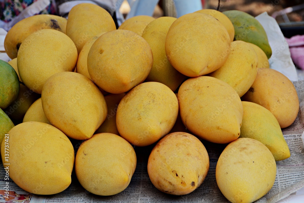 The mangoes were sold by market vendors in Thailand. The mangoes were sold by market vendors in Thailand.