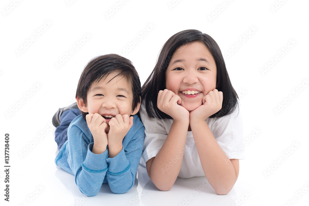 Asian children lying on white background isolated Asian children lying on white background isolated