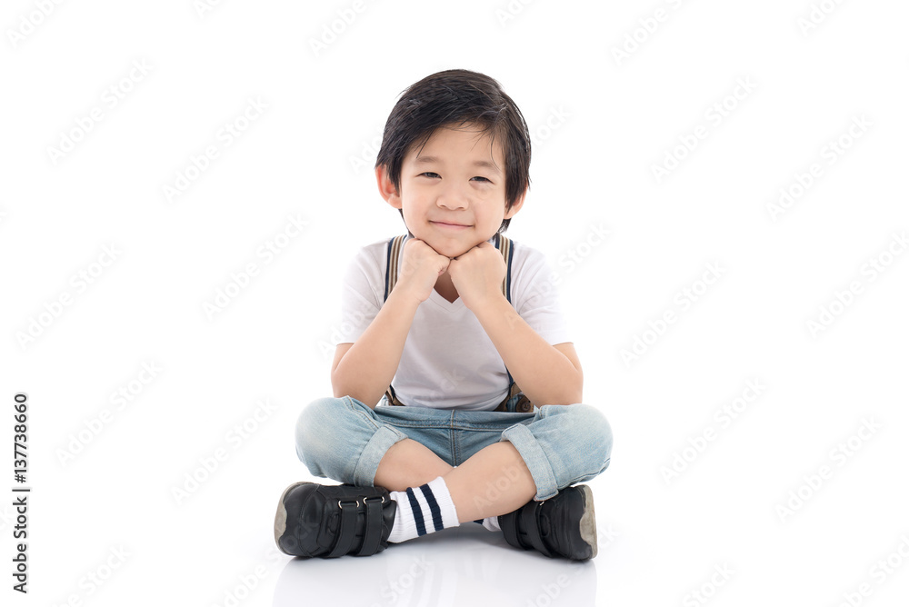 asian boy sitting on white background asian boy sitting on white background