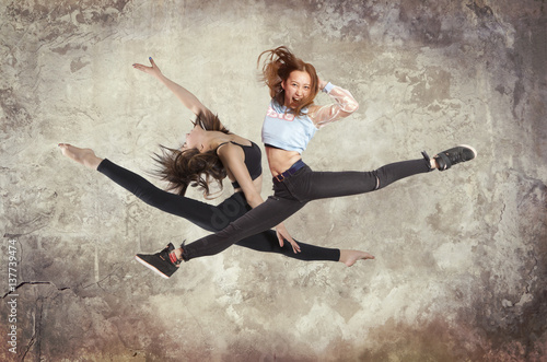 Young woman modern ballet dancing