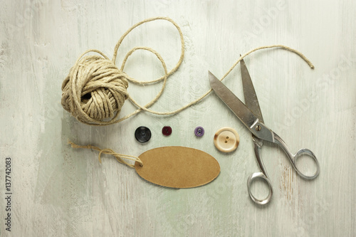 Vintage scissors, twine, and tag with copyspace